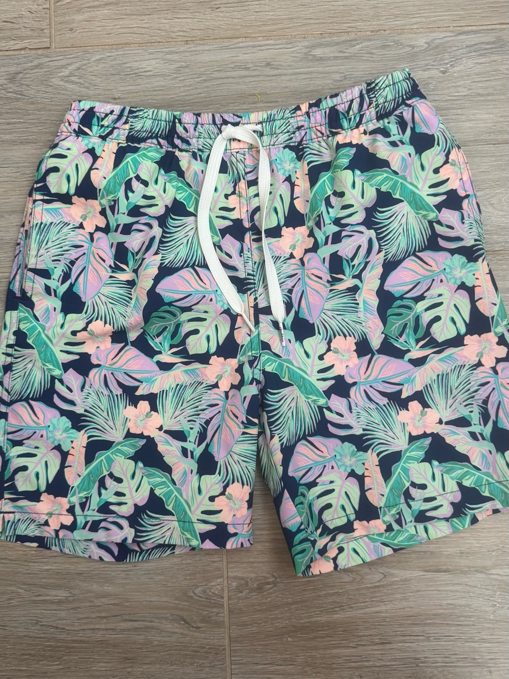 chubbies Navy Swim Trunks with Pastel Pink & Mint Tropical Print